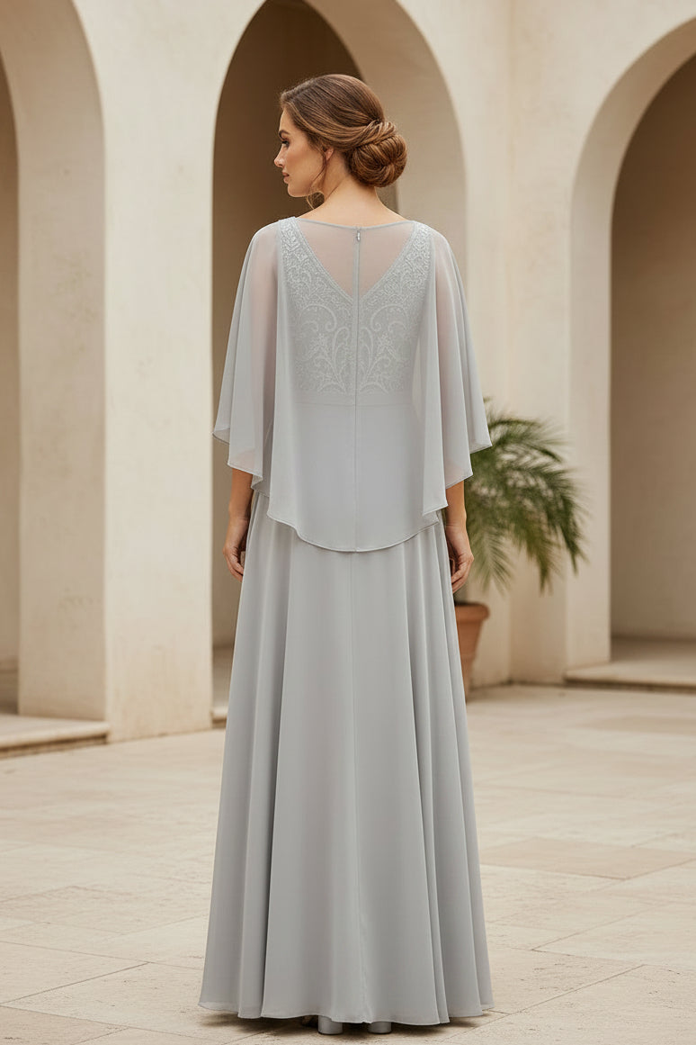Vestido de noche de línea A con corpiño de encaje y capa de gasa en las mangas