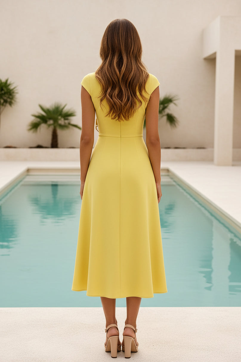 Vestido midi acampanado con apliques florales