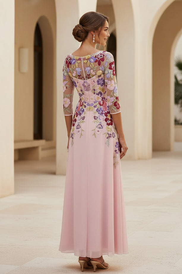 Vestido de gala de gasa con corpiño de malla bordado floral