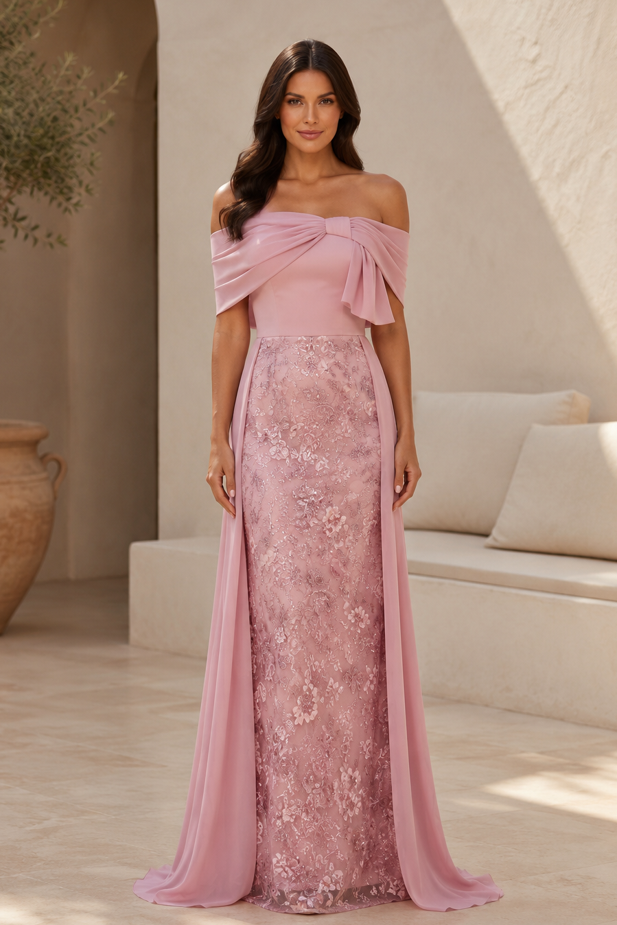 Vestido de encaje con hombros descubiertos y detalles de chifón en cascada