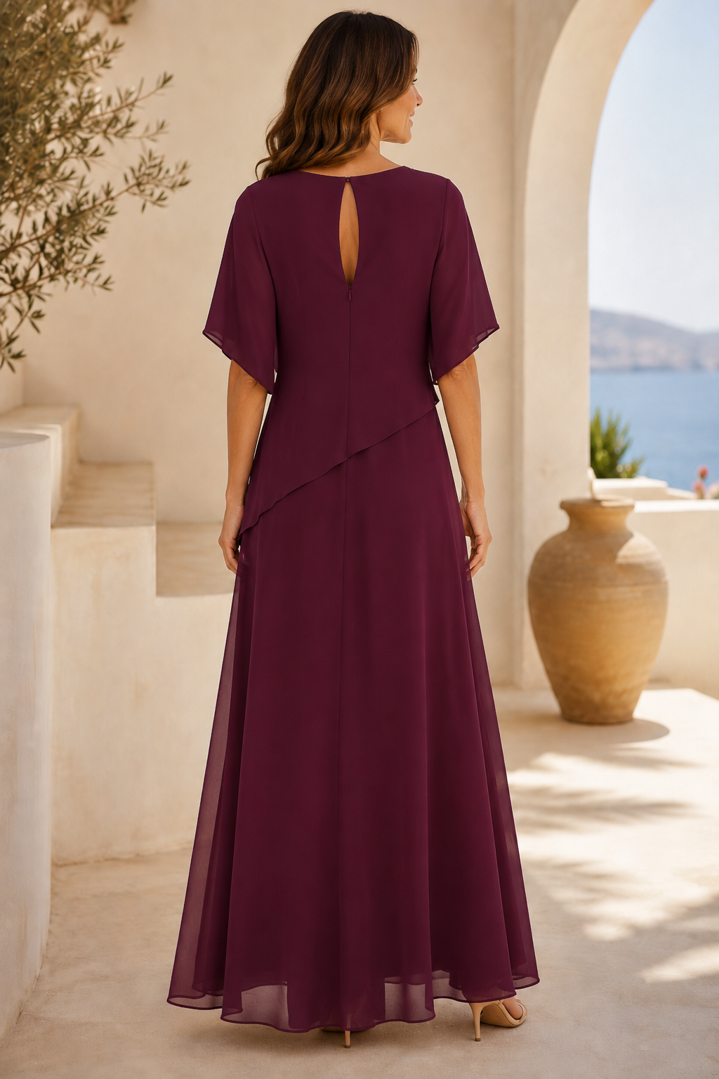 Vestido largo de gasa con volantes en capas y manga mariposa