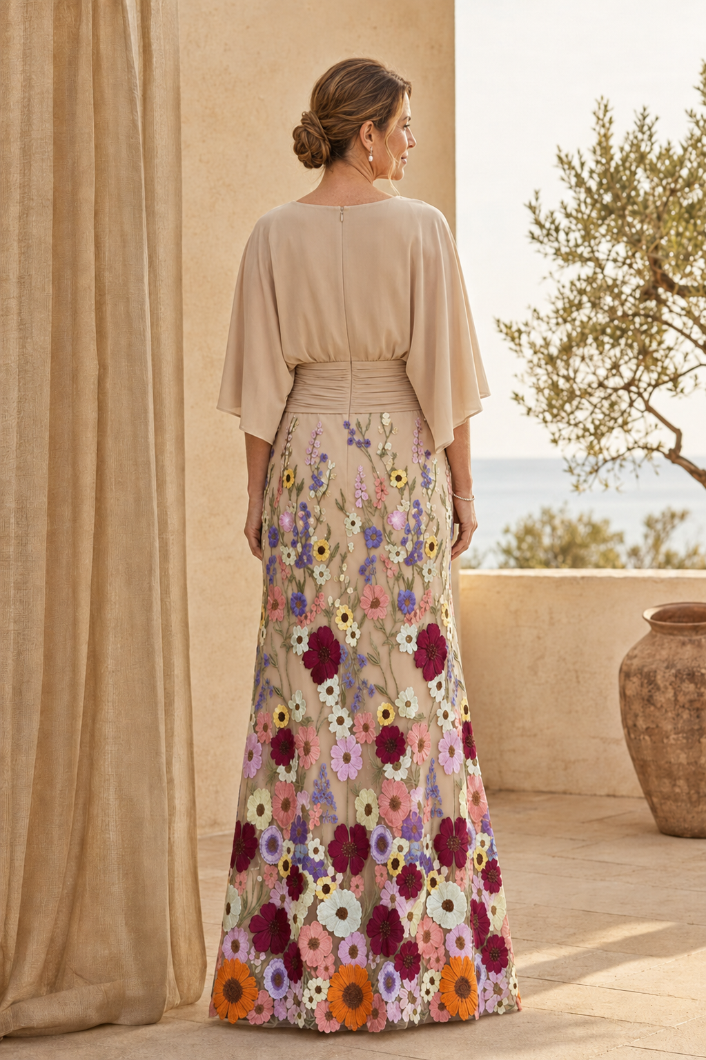 Vestido largo floral bordado con mangas de volantes