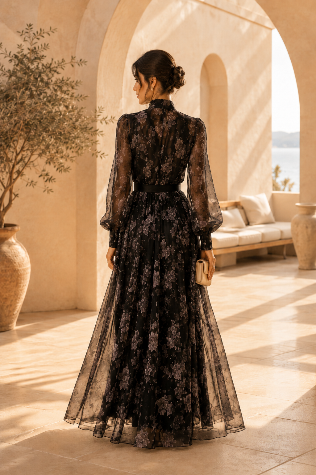 Vestido largo floral con cuello anudado y mangas largas