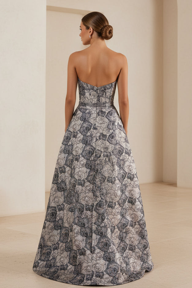 Vestido de noche largo sin tirantes con jacquard floral y dobladillo asimétrico