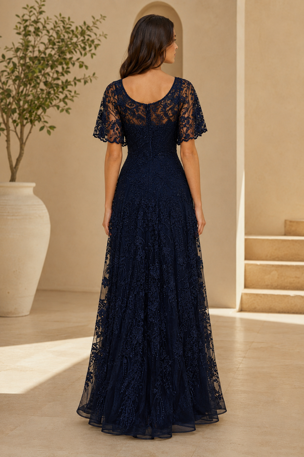 Vestido de noche acampanado con encaje y manga con volantes