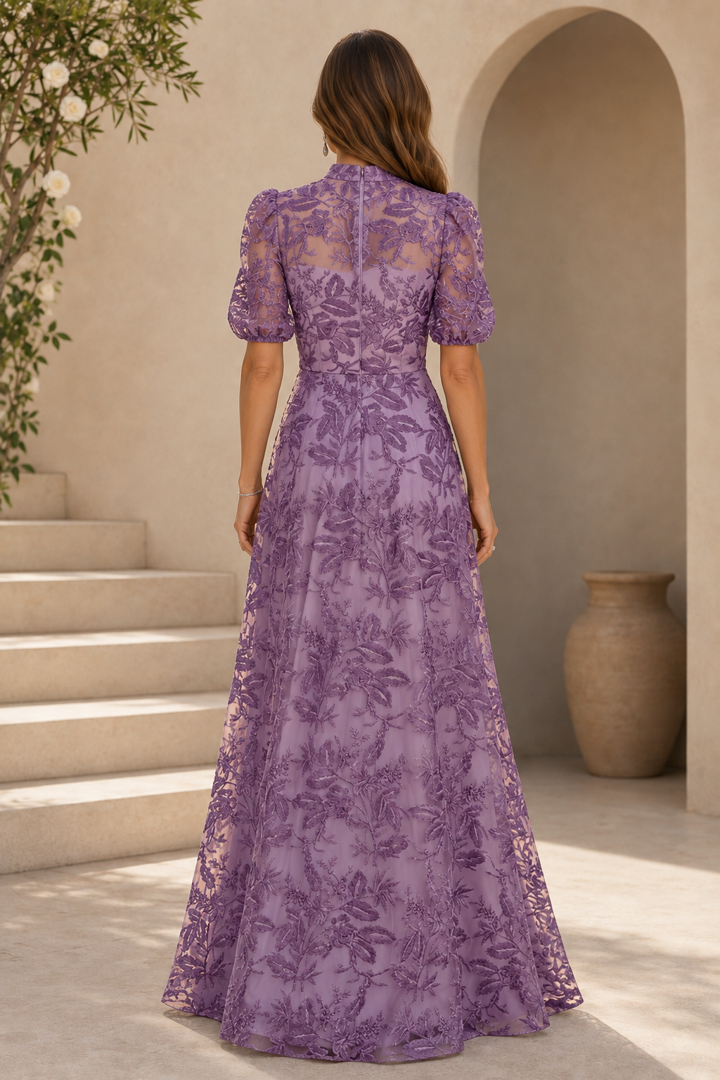 Vestido acampanado de encaje bordado con mangas abullonadas