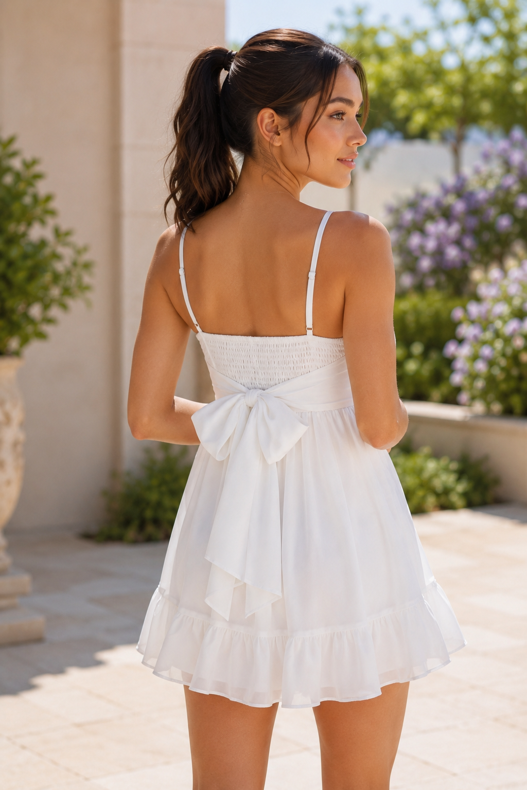 Minivestido de gasa con escote corazón y lazo trasero