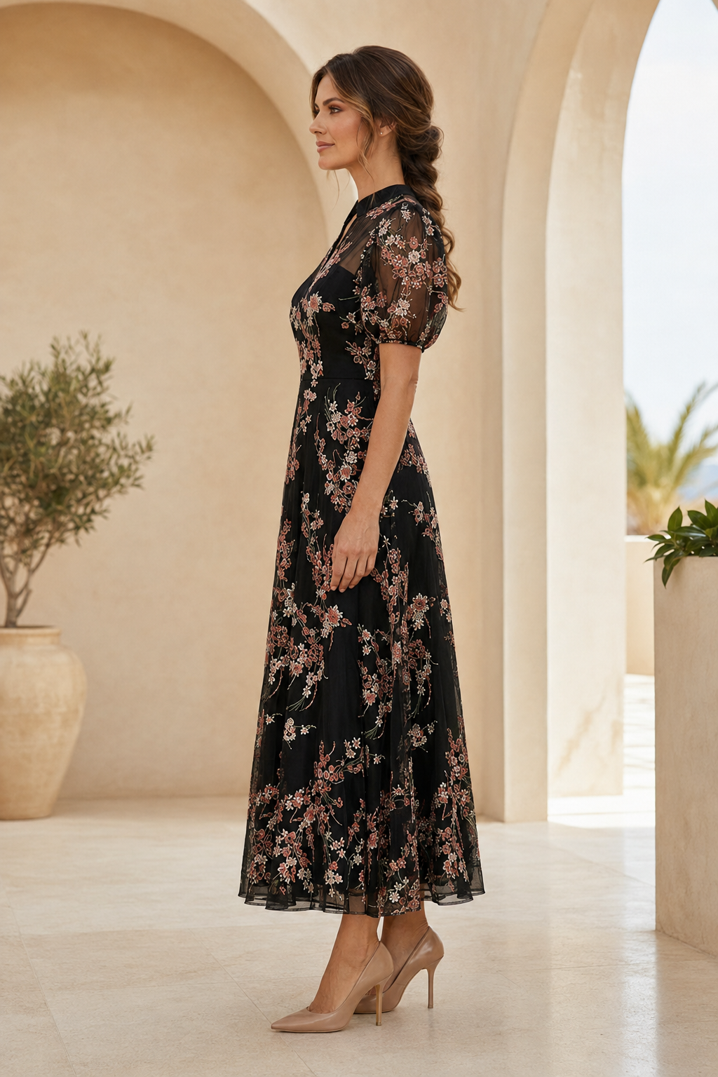 Vestido midi acampanado con mangas abullonadas y bordado floral