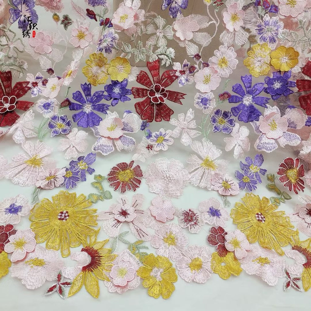 Vestido de gala de gasa con corpiño de malla bordado floral