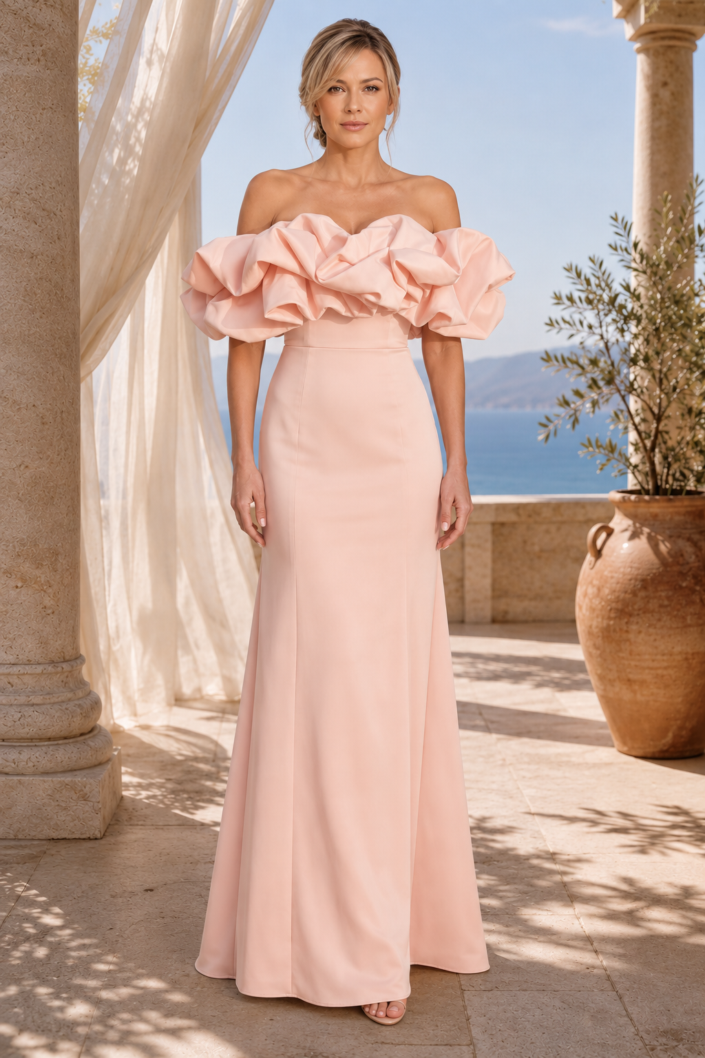Vestido de noche con hombros descubiertos, volantes y corte sirena