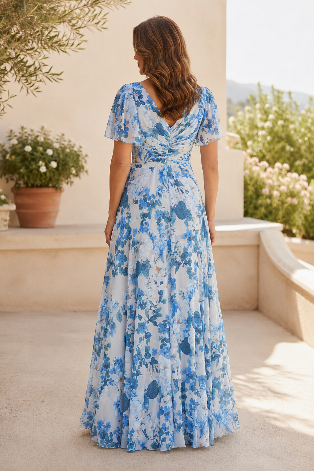 Vestido maxi acampanado con estampado floral y manga con volantes