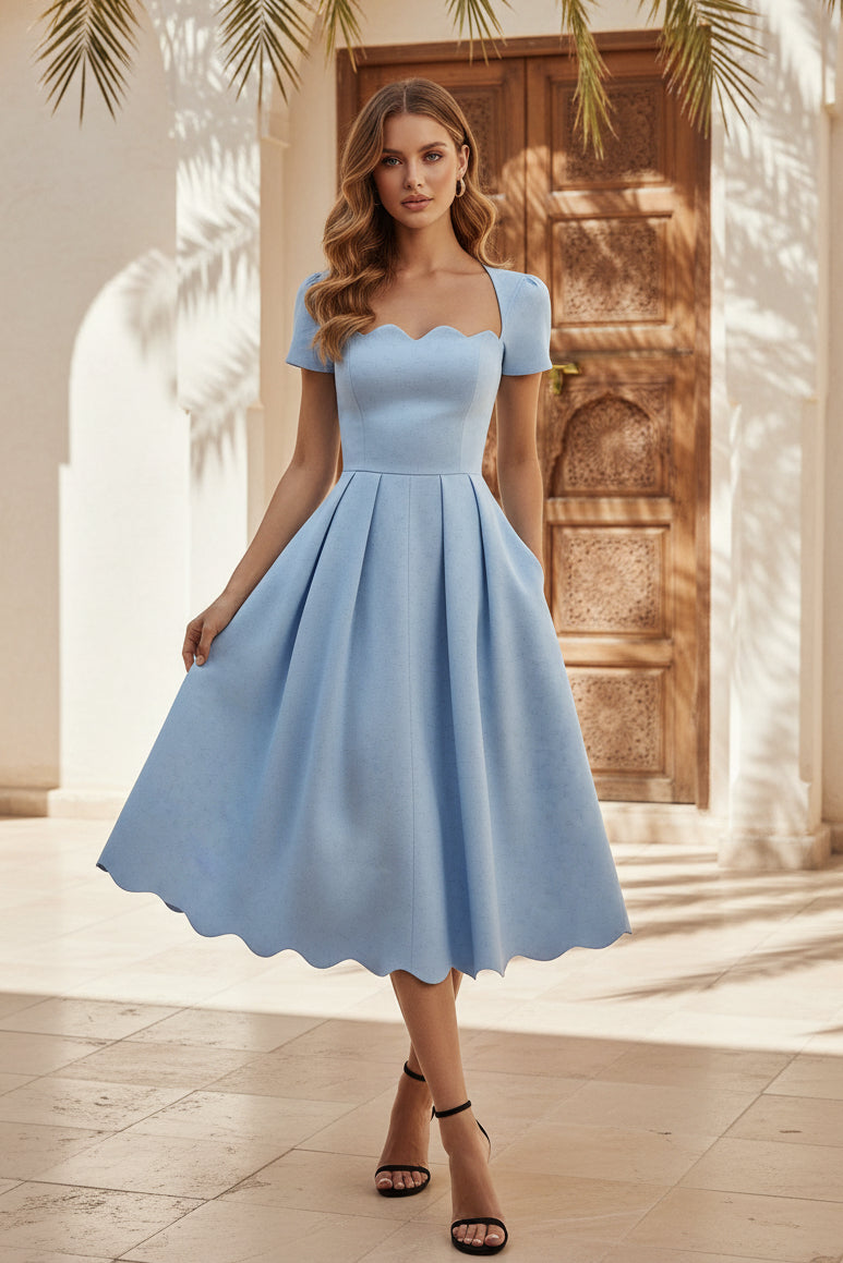 Vestido midi plisado con dobladillo festoneado y bolsillos