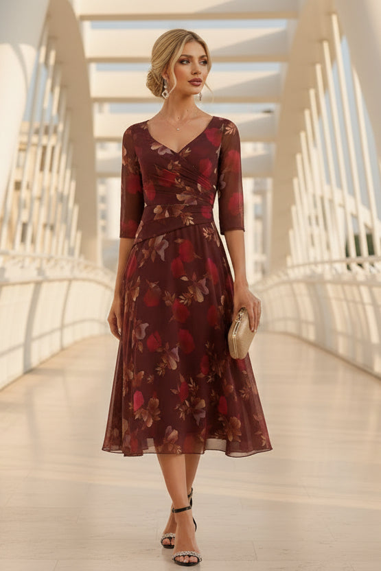 Vestido midi acampanado con escote en V y gasa floral