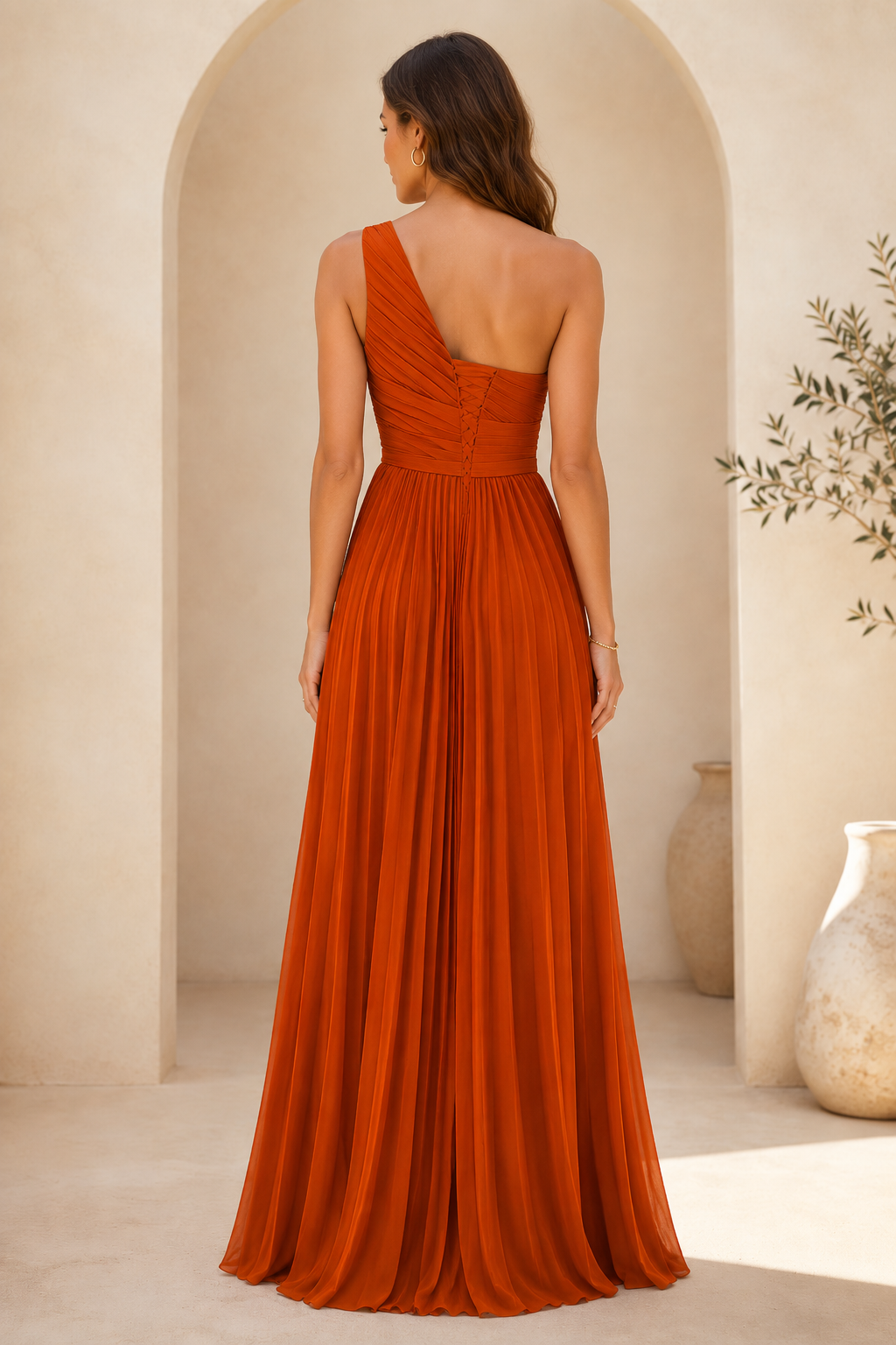 Vestido largo plisado de un solo hombro con volantes