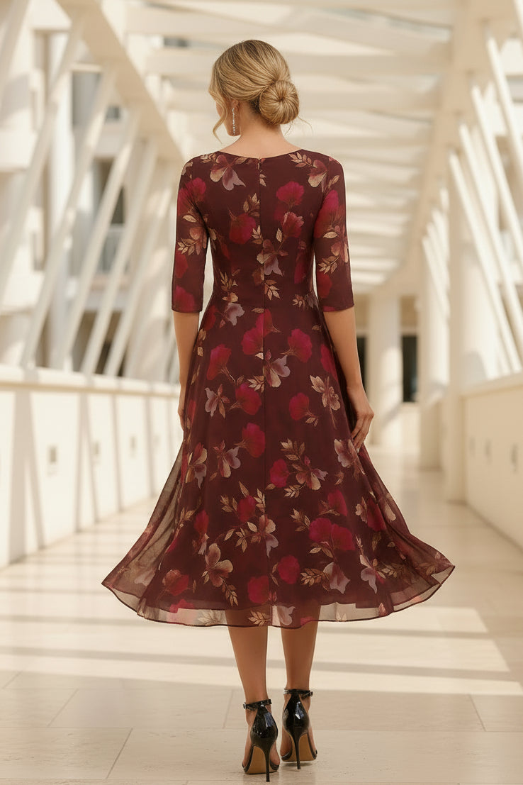 Vestido midi acampanado con escote en V y gasa floral