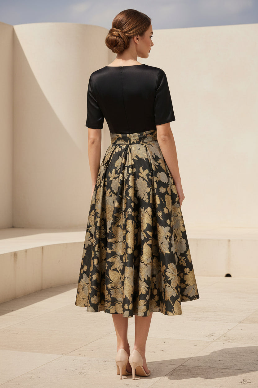 Vestido acampanado a media pierna de jacquard floral con lazo