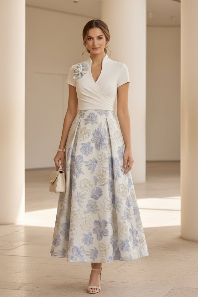 Vestido midi de jacquard floral con corpiño cruzado