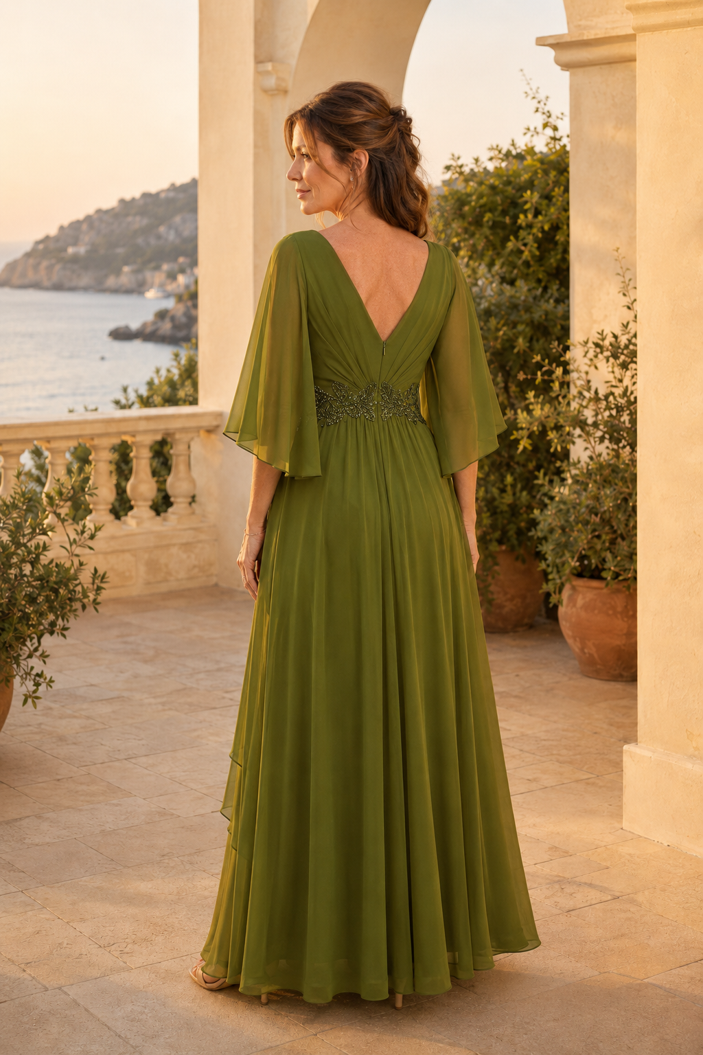 Vestido de noche acampanado con escote en V, mangas con volantes y cintura de cuentas